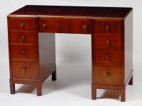 Lot 406 - An Art Deco walnut inverted breakfront...