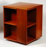 Lot 377 - A 1960s English teak revolving bookcase, of...