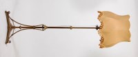 Lot 389 - An Art Nouveau brass standard lamp, having a...