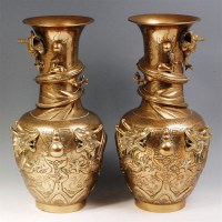 Lot 797 - A pair of circa 1900 Chinese brass vases, each...