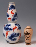 Lot 801 - A 17th century Chinese double gourd vase,...