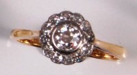 Lot 684 - An 18ct gold, platinum and diamond cluster...