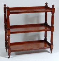 Lot 964 - A Victorian mahogany three tier buffet, each...