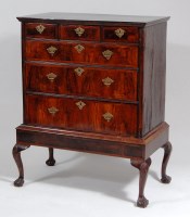 Lot 966 - An early 18th century walnut chest on later...