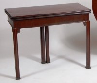 Lot 972 - A George III mahogany card table, having a...