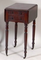 Lot 987 - A George IV mahogany work table, having fall...