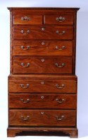 Lot 1003 - A George III mahogany chest-on-chest, having a...