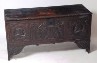 Lot 1004 - A circa 1700 planked oak coffer, the front...