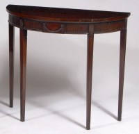 Lot 970 - A Waring & Gillows mahogany demi-lune hall...