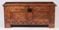 Lot 1018 - An 18th century Continental elm coffer, of...