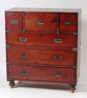 Lot 1022 - A mid 19th century teak campaign secretaire...