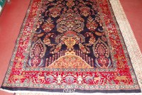 Lot 943 - A Persian Ishafan small carpet, the blue...