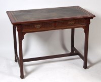 Lot 1014 - A circa 1900 mahogany two drawer writing table,...