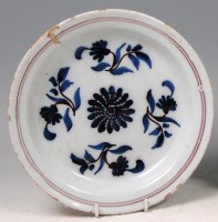 Lot 549 - A mid 18th century English Delft plate,...