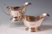 Lot 572 - A pair of George V silver pedestal sauceboats,...