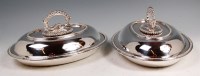 Lot 588 - A pair of late Victorian silver lidded entree...