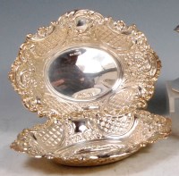 Lot 595 - A pair of late Victorian style silver bonbon...