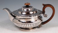 Lot 599 - A George III old Sheffield plate teapot,...