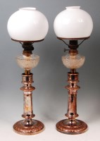 Lot 600 - A pair of Old Sheffield Plate oil lamps, each...