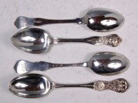 Lot 603 - A matched set of four silver dessert spoons,...