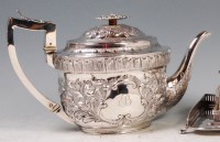 Lot 623 - A George III silver teapot, of oval form,...