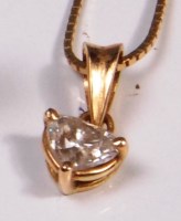 Lot 671 - A contemporary gold mounted diamond pendant,...