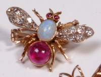 Lot 687 - A yellow gold insect brooch, the body set with...