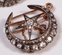 Lot 704 - A circa 1900 yellow gold and platinum star and...