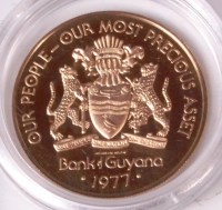 Lot 730 - A Bank of Guyana 100 dollars 0.500 gold coin,...