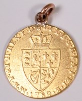 Lot 737 - A George III gold spade guinea with pendant...