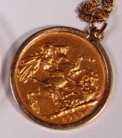 Lot 743 - A George V gold sovereign, 1913, in 9ct gold...