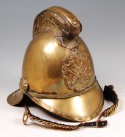 Lot 768 - A brass Merryweather patent firemans helmet,...