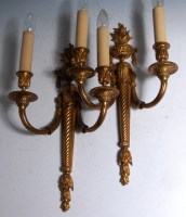 Lot 783 - A pair of Neo-Classical ormolu twin branch...