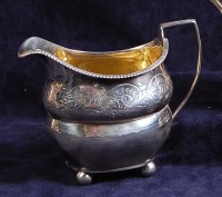 Lot 603 - A late Georgian silver cream jug, having a...