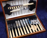 Lot 631 - A cased set of six silver bladed fish knives...