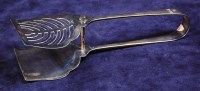 Lot 636 - A pair of George V silver serving tongs, in...