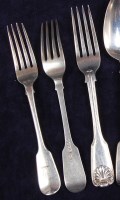 Lot 645 - A harlequin set of five silver table forks, in...