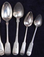 Lot 646 - A set of four George III silver tablespoons,...