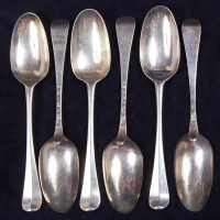 Lot 647 - A set of six George II silver dessert spoons,...