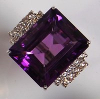 Lot 673 - A contemporary 18ct white gold, amethyst and...