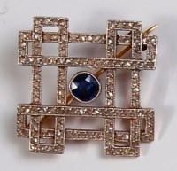 Lot 679 - An Art Deco sapphire and diamond set brooch,...