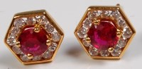 Lot 701 - A pair of 18ct gold ruby and diamond ear studs,...