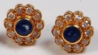 Lot 702 - A pair of yellow gold sapphire and diamond set...