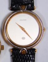 Lot 706 - A modern Gucci gents dress watch, having plain...