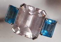 Lot 709 - An Art Deco style 18ct gold, blue topaz and...