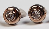 Lot 720 - A pair of contemporary 18ct white gold diamond...