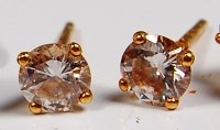 Lot 721 - A pair of 18ct gold diamond set ear studs,...