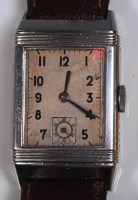 Lot 723 - A Jaeger le Coultre steel cased gents reverso...