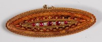 Lot 730 - An Edwardian yellow gold ruby and diamond set...