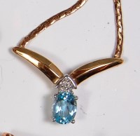 Lot 733 - A contemporary 10ct gold, blue topaz and...